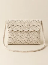 Shell Clutch in Milk, front view